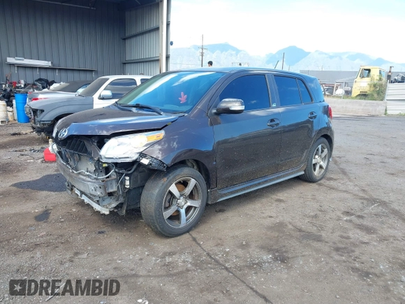 2011 Scion xD with VIN JTKKU4B46B1008873, listed as a IAAI auction lot 41871913 with 145,722 mi miles. Bid and sale history available at carsss.com. Image 2.