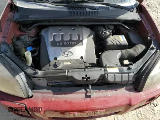 2006 Hyundai Tucson GLS with VIN KM8JN72D86U375517, listed as a Copart auction lot 77829324 with 191,899 mi miles and Salvage Title. Bid and sale history available at carsss.com. Image 12.