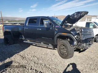 2021 GMC Sierra 3500HD Denali z VIN 1GT49WEY3MF296109, wystawiony jako Copart lot #67886764 z przebiegiem Nie podano mil oraz Szkody całkowita. Historia ofert i sprzedaży dostępna na DreamBid. Obrazek 4.