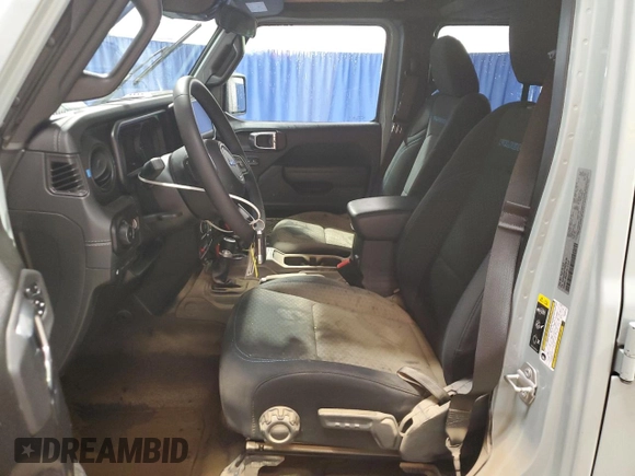 2024 Jeep Wrangler Rubicon with VIN 1C4RJXR67RW293197, listed as a Copart auction lot 59886995 with Not provided miles and Salvage title. Bid and sale history available at DreamBid. Image 7.