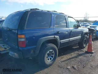 2002 Chevrolet Tahoe LT with VIN 1GNEK13Z42J140816, listed as a IAAI auction lot 41973686 with 241,722 mi miles. Bid and sale history available at carsss.com. Image 4.