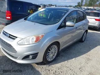 2013 Ford C-Max Hybrid SEL with VIN 1FADP5BU8DL520712, listed as a IAAI auction lot 41158589 with 175,025 mi miles. Bid and sale history available at carsss.com. Image 2.
