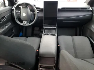 2023 Fisker Ocean Ultra z VIN VCF1UBU25PG008967, wystawiony jako Copart lot #87314004 z przebiegiem Nie podano mil oraz Tytuł czysty. Historia ofert i sprzedaży dostępna na DreamBid. Obrazek 8.