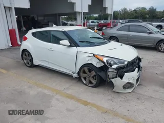 2013 Hyundai Veloster Turbo with VIN KMHTC6AE2DU170176, listed as a IAAI auction lot 41324519 with 105,562 mi miles and . Bid and sale history available at DreamBid. Image 1.