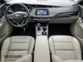 2023 Cadillac XT4 FWD Premium Luxury z VIN 1GYFZCR44PF105116, wystawiony jako Copart lot #51945915 z przebiegiem 20 669 mil mil oraz Szkoda całkowita • Salvage title. Historia ofert i sprzedaży dostępna na DreamBid. Obrazek 8.