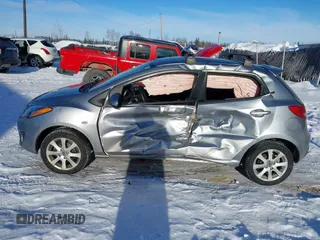 2013 Mazda 2 Touring z VIN JM1DE1LYXD0153291, wystawiony jako IAAI lot #41671574 z przebiegiem Nie podano mil oraz . Historia ofert i sprzedaży dostępna na DreamBid. Obrazek 13.