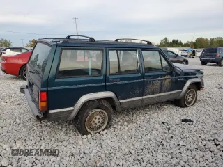1996 Jeep Cherokee Country with VIN 1J4FJ78S7TL242853, listed as a Copart auction lot 73022554 with 84,868 mi miles and Salvage Title. Bid and sale history available at carsss.com. Image 3.
