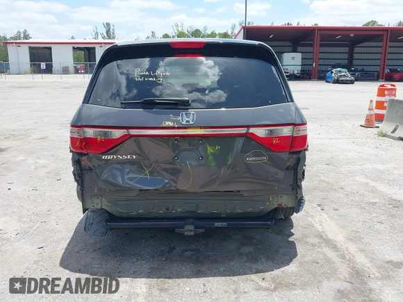 2013 Honda Odyssey Touring with VIN 5FNRL5H96DB068843, listed as a IAAI auction lot 42312176 with 115,804 mi miles and . Bid and sale history available at DreamBid. Image 17.