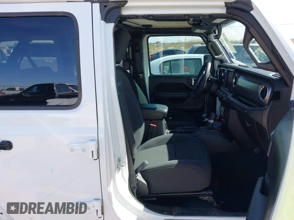 2023 Jeep Wrangler Rubicon with VIN 1C4JJXR63PW580370, listed as a IAAI auction lot 42017282 with 31,823 mi miles and . Bid and sale history available at DreamBid. Image 5.