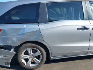 2018 Honda Odyssey EX-L with VIN 5FNRL6H71JB089289, listed as a IAAI auction lot 41813322 with 94,933 mi miles and . Bid and sale history available at DreamBid. Image 18.