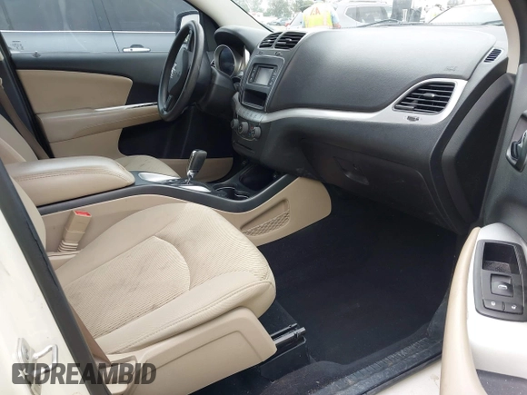 2014 Dodge Journey American Value with VIN 3C4PDCAB8ET141803, listed as a IAAI auction lot 42097292 with 76,339 mi miles and . Bid and sale history available at DreamBid. Image 5.