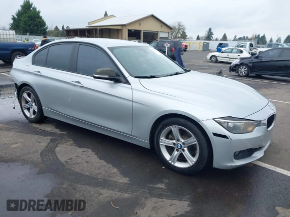 2013 BMW 3 Series 328i with VIN WBA3C1C51DF438981, listed as a IAAI auction lot 41741049 with 135,499 mi miles. Bid and sale history available at carsss.com. Image 1.
