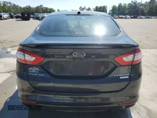 2014 Ford Fusion Titanium с VIN 3FA6P0K99ER282184, выставлен на аукционе Copart как лот 55485705 с пробегом 170 551 миль миль и Списание • Salvage title. История ставок и продаж доступна на DreamBid. Изображение 6.