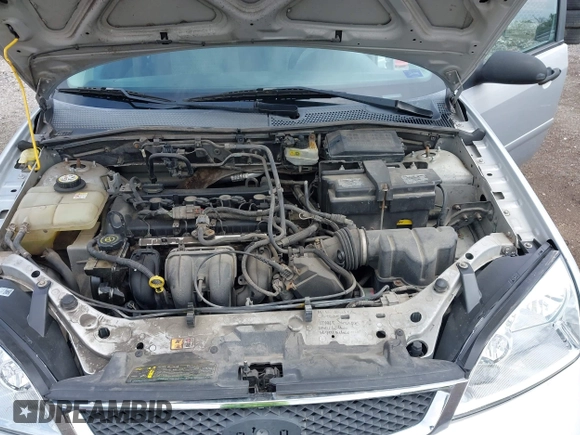 2007 Ford Focus S with VIN 1FAFP34N07W141693, listed as a IAAI auction lot 42310938 with 150,489 mi miles and . Bid and sale history available at DreamBid. Image 10.
