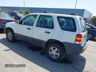 2004 Ford Escape XLS with VIN 1FMYU02124KA81554, listed as a IAAI auction lot 42117165 with 211,579 mi miles and . Bid and sale history available at DreamBid. Image 3.