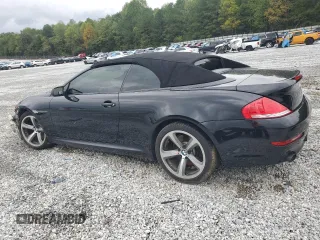 2009 BMW 6 Series 650i with VIN WBAEB53529C224402, listed as a Copart auction lot 73476784 with 140,595 mi miles and Salvage Title. Bid and sale history available at carsss.com. Image 2.