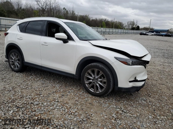 2021 Mazda CX-5 Grand Touring with VIN JM3KFBDM2M1436789, listed as a Copart auction lot 49534305 with 65,790 mi miles and Salvage Title. Bid and sale history available at carsss.com. Image 4.