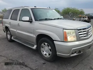 2004 Cadillac Escalade z VIN 1GYEC63T64R285823, wystawiony jako Copart lot #59167915 z przebiegiem 289 955 mil mil oraz Szkoda całkowita • Salvage title. Historia ofert i sprzedaży dostępna na DreamBid. Obrazek 14.