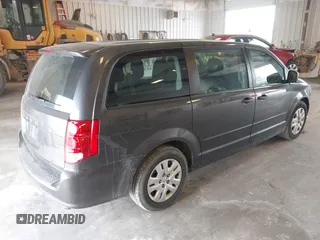 2016 Dodge Grand Caravan SE with VIN 2C4RDGBG1GR117200, listed as a IAAI auction lot 42104773 with 121,007 mi miles and . Bid and sale history available at DreamBid. Image 4.