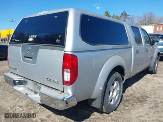 2007 Nissan Frontier SE with VIN 1N6AD09W97C423696, listed as a IAAI auction lot 42010577 with 117,096 mi miles. Bid and sale history available at carsss.com. Image 4.