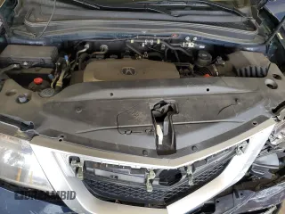 2012 Acura MDX z VIN 2HNYD2H23CH524665, wystawiony jako Copart lot #54745455 z przebiegiem 122 992 mil mil oraz Szkoda całkowita • Salvage title. Historia ofert i sprzedaży dostępna na DreamBid. Obrazek 12.