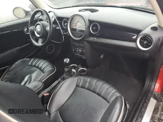 2011 MINI Hardtop z VIN WMWSU3C52BT099618, wystawiony jako Copart lot #78232484 z przebiegiem 98 302 mil mil oraz Czysty tytuł • Clean title. Historia ofert i sprzedaży dostępna na DreamBid. Obrazek 8.