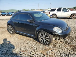 2012 Volkswagen Beetle 2.0T Turbo w/Sun/Sound PZEV with VIN 3VWVA7AT5CM635721, listed as a Copart auction lot 75693314 with 181,890 mi miles and Salvage Title. Bid and sale history available at carsss.com. Image 4.