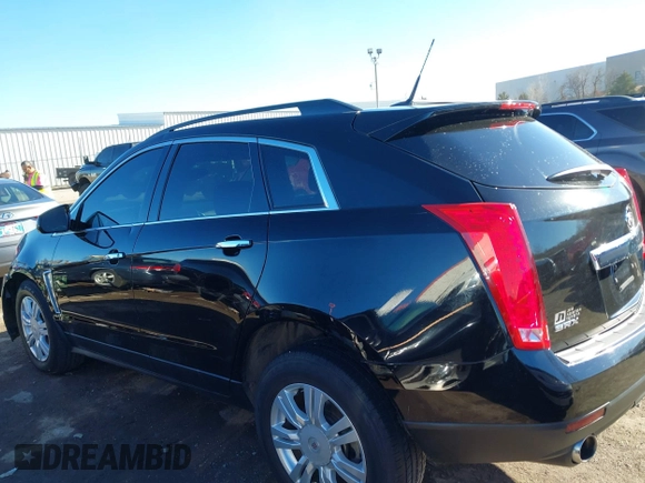2014 Cadillac SRX with VIN 3GYFNAE32ES550136, listed as a IAAI auction lot 41219755 with 161,878 mi miles and . Bid and sale history available at DreamBid. Image 14.