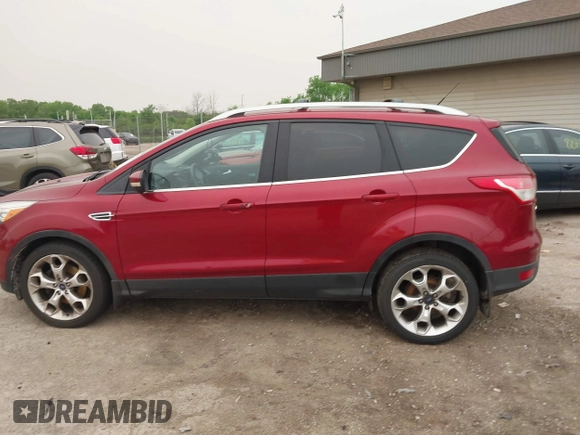 2015 Ford Escape Titanium with VIN 1FMCU9J96FUC02177, listed as a IAAI auction lot 42312928 with 100,716 mi miles and . Bid and sale history available at DreamBid. Image 14.