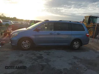 2007 Honda Odyssey EX-L z VIN 5FNRL38717B035384, wystawiony jako IAAI lot #41976861 z przebiegiem 211 640 mil mil oraz . Historia ofert i sprzedaży dostępna na DreamBid. Obrazek 14.