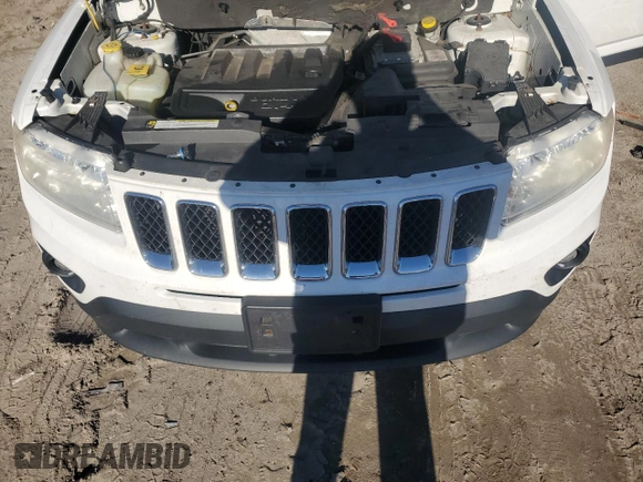 2012 Jeep Compass Latitude with VIN 1C4NJDEB4CD537763, listed as a Copart auction lot 84878244 with 198,582 mi miles and Clean Title. Bid and sale history available at DreamBid. Image 12.