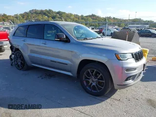 2020 Jeep Grand Cherokee Overland with VIN 1C4RJFCG8LC158475, listed as a IAAI auction lot 40665109 with 77,233 mi miles. Bid and sale history available at carsss.com. Image 1.