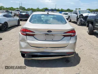 2017 Ford Fusion SE z VIN 3FA6P0HD7HR363913, wystawiony jako Copart lot #63848065 z przebiegiem 121 589 mil mil oraz Czysty tytuł • Clean title. Historia ofert i sprzedaży dostępna na DreamBid. Obrazek 6.