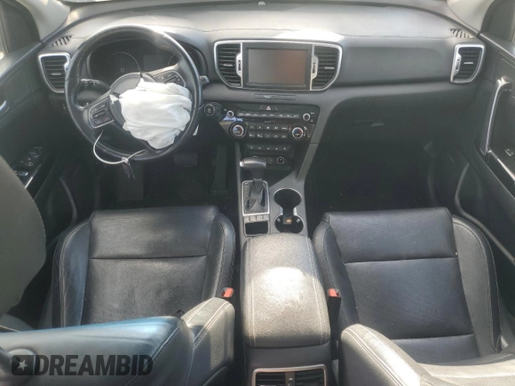 2018 Kia Sportage EX z VIN KNDPNCAC1J7308457, wystawiony jako Copart lot #81574704 z przebiegiem Nie podano mil oraz Szkoda całkowita • Salvage title. Historia ofert i sprzedaży dostępna na DreamBid. Obrazek 8.