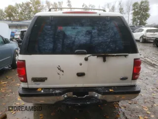 1997 Ford Expedition XLT z VIN 1FMEU17L6VLA61113, wystawiony jako Copart lot #73465703 z przebiegiem 184 878 mil mil oraz Czysty tytuł • Clean title. Historia ofert i sprzedaży dostępna na DreamBid. Obrazek 6.