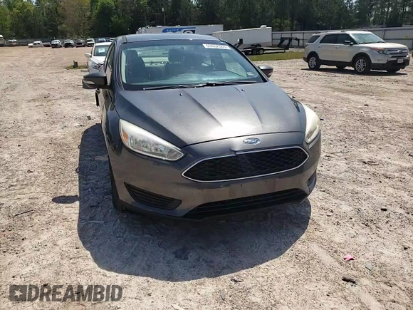 2016 Ford Focus SE z VIN 1FADP3F23GL355587, wystawiony jako Copart lot #53462345 z przebiegiem 101 628 mil mil oraz Szkoda całkowita • Salvage title. Historia ofert i sprzedaży dostępna na DreamBid. Obrazek 13.