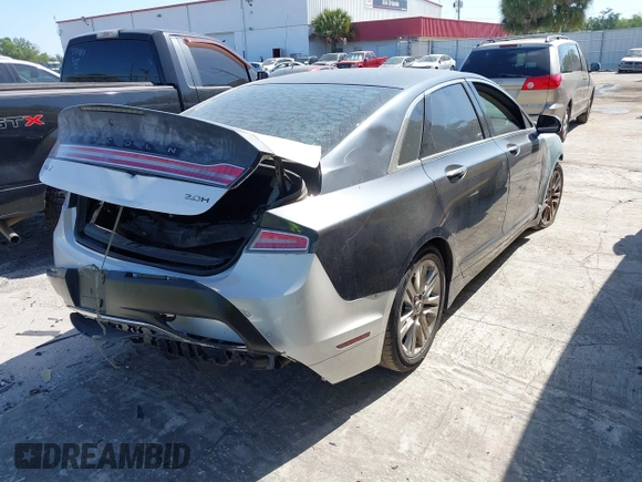 2014 Lincoln MKZ with VIN 3LN6L2GK9ER818561, listed as a IAAI auction lot 42063387 with 143,803 mi miles. Bid and sale history available at carsss.com. Image 4.