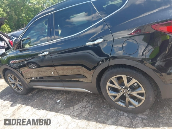 2017 Hyundai Santa Fe Ultimate with VIN 5NMZW4LA1HH052430, listed as a IAAI auction lot 42205489 with 85,720 mi miles and . Bid and sale history available at DreamBid. Image 14.