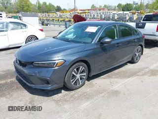 2024 Honda Civic LX z VIN 19XFL2H57RE021316, wystawiony jako IAAI lot #42031580 z przebiegiem 18 598 mil mil oraz . Historia ofert i sprzedaży dostępna na DreamBid. Obrazek 17.