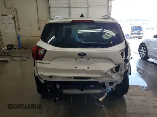 2019 Ford Escape Titanium с VIN 1FMCU0J94KUA44606, выставлен на аукционе Copart как лот 51790035 с пробегом 70 190 миль миль и На запчасти • Non repairable. История ставок и продаж доступна на DreamBid. Изображение 6.