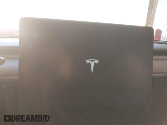 2023 Tesla Model Y Long Range with VIN 7SAYGDEE5PA033341, listed as a IAAI auction lot 41379625 with Not provided miles and . Bid and sale history available at DreamBid. Image 18.