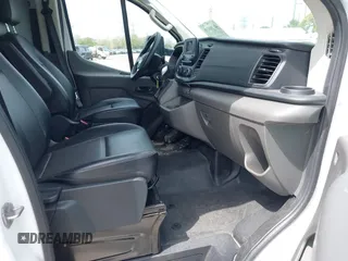 2023 Ford Transit Cargo with VIN 1FTBR1Y82PKA22661, listed as a IAAI auction lot 41768039 with 30,800 mi miles and . Bid and sale history available at DreamBid. Image 5.