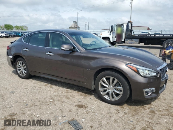 2019 Infiniti Q70 Luxe with VIN JN1BY1AR2KM585067, listed as a Copart auction lot 57527895 with 62,965 mi miles and Salvage title. Bid and sale history available at DreamBid. Image 4.