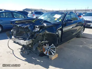 2015 BMW 2 Series 228i with VIN WBA1K5C57FV473826, listed as a IAAI auction lot 41866820 with 130,823 mi miles. Bid and sale history available at carsss.com. Image 2.