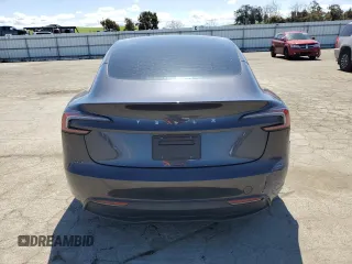 2024 Tesla Model 3 z VIN 5YJ3E1EA9RF820808, wystawiony jako Copart lot #51255605 z przebiegiem 12 216 mil mil oraz Szkody całkowita. Historia ofert i sprzedaży dostępna na DreamBid. Obrazek 6.