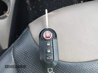 2015 FIAT 500L Lounge z VIN ZFBCFACH6FZ035281, wystawiony jako IAAI lot #42306531 z przebiegiem 99 810 mil mil oraz . Historia ofert i sprzedaży dostępna na DreamBid. Obrazek 11.