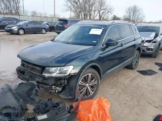 2019 Volkswagen Tiguan SE with VIN 3VV2B7AX1KM154435, listed as a IAAI auction lot 41740969 with 103,310 mi miles. Bid and sale history available at carsss.com. Image 2.