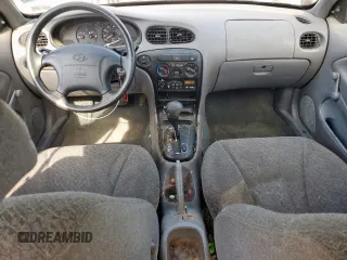 1999 Hyundai Elantra z VIN KMHJF25F1XU777099, wystawiony jako Copart lot #58870035 z przebiegiem 69 470 mil mil oraz Czysty tytuł • Clean title. Historia ofert i sprzedaży dostępna na DreamBid. Obrazek 8.