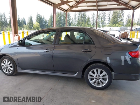 2009 Toyota Corolla with VIN 1NXBU40E79Z133873, listed as a IAAI auction lot 42132035 with 232,578 mi miles. Bid and sale history available at carsss.com. Image 14.