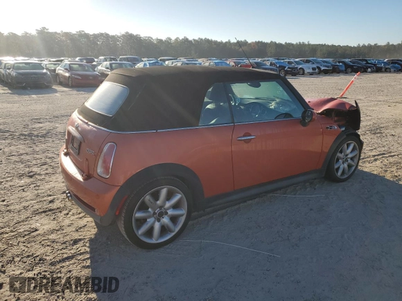 2007 MINI Convertible S with VIN WMWRH33587TJ43499, listed as a Copart auction lot 76266684 with 103,691 mi miles and Salvage title. Bid and sale history available at DreamBid. Image 3.